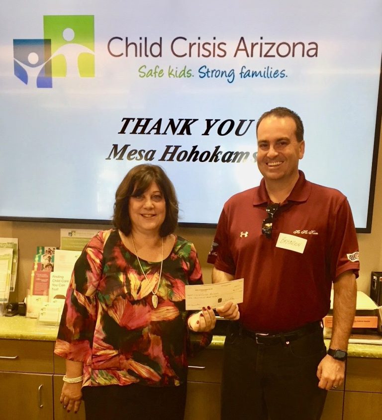 HoHoKam, Brandon Smith presenting check to The Child Crisis Arizona