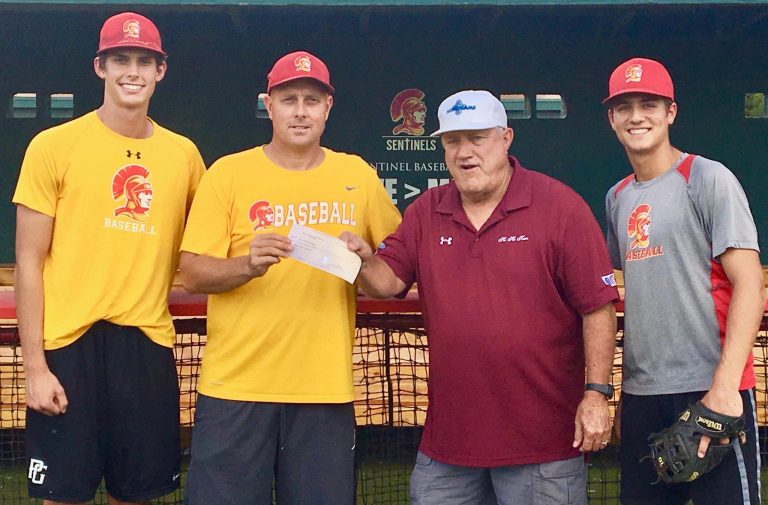 HoHoKam, Tim Gump presents a check from the HoHoKam Foundation to The Seton High School Baseball program.
