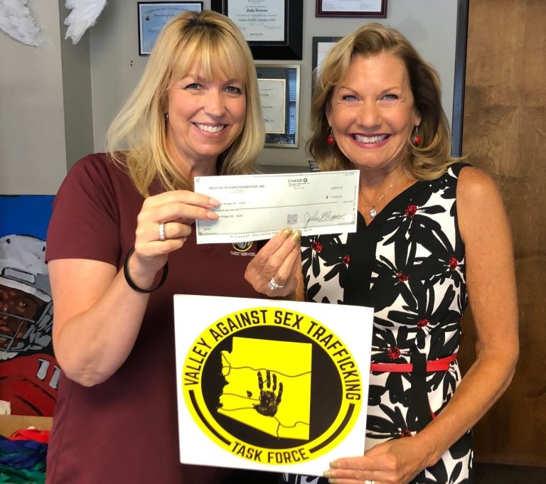 Mesa HoHoKam presents a check to Valley Against Sex Trafficking Task Force