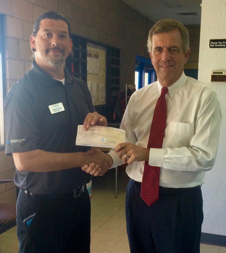 Little Ho, Tim Baughman, presenting a check, to Chris Quasdula with The Boys & Girls Clubs of the East Valley, Grant Woods - Mesa Branch, from the Mesa HoHoKam Foundation 2017 Grant Program.