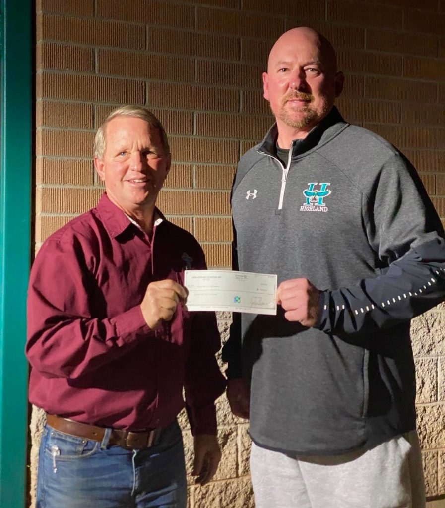 Mesa HoHoKam, Bryan Vivian, presents a check, from the Mesa HoHoKam Foundation, Coach Kehoe, Head Baseball Coach at Highland Highland High School, for the Triple Play Baseball Boosters