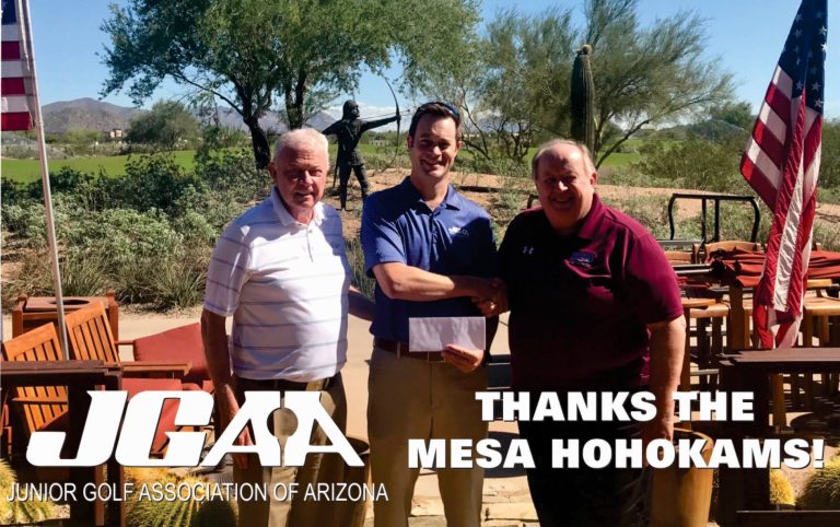 Mesa HoHoKam member, Kim Harris, presents a check, from the Mesa HoHoKam Foundation to Scott McNevin with Arizona Junior Golf