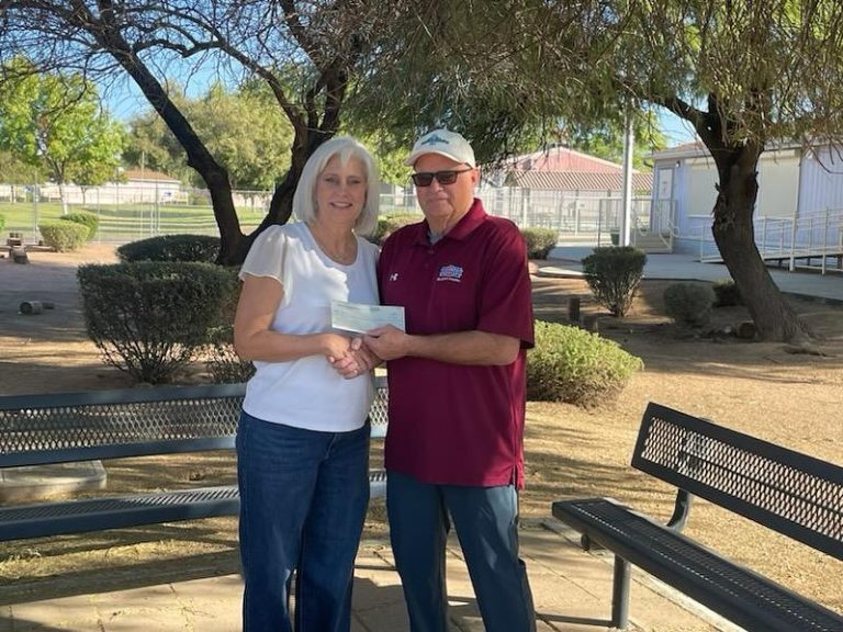 Mesa Hohokam, Mark Grant presents Sports Foundation Check to: Karen Eulate CCO of Lōkahi Team.