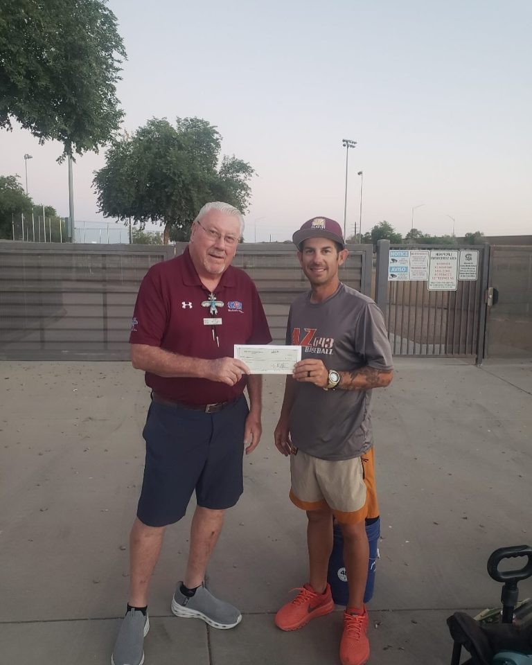 Mesa HoHoKam, Gary Whitley presents 50/50 Grant check to Jeff Landry owner of AZ643 Baseball organization.