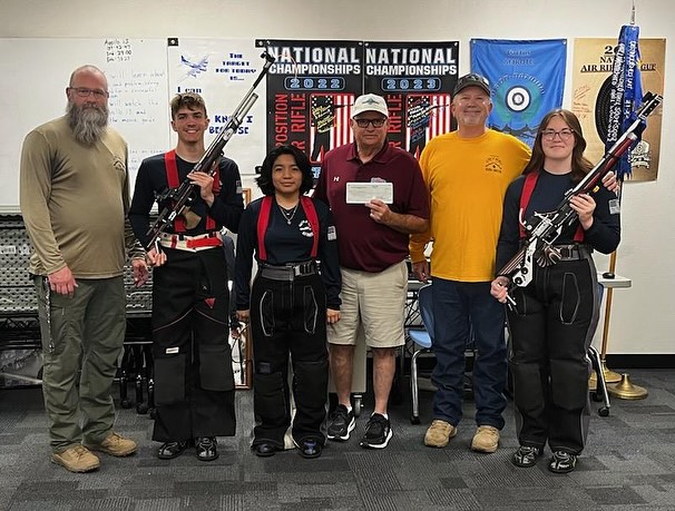 Mesa HoHoKam, Mark Grant presents a Grant check to Program Director Dan Palmer - USFT Youth Shooting Sports Program.