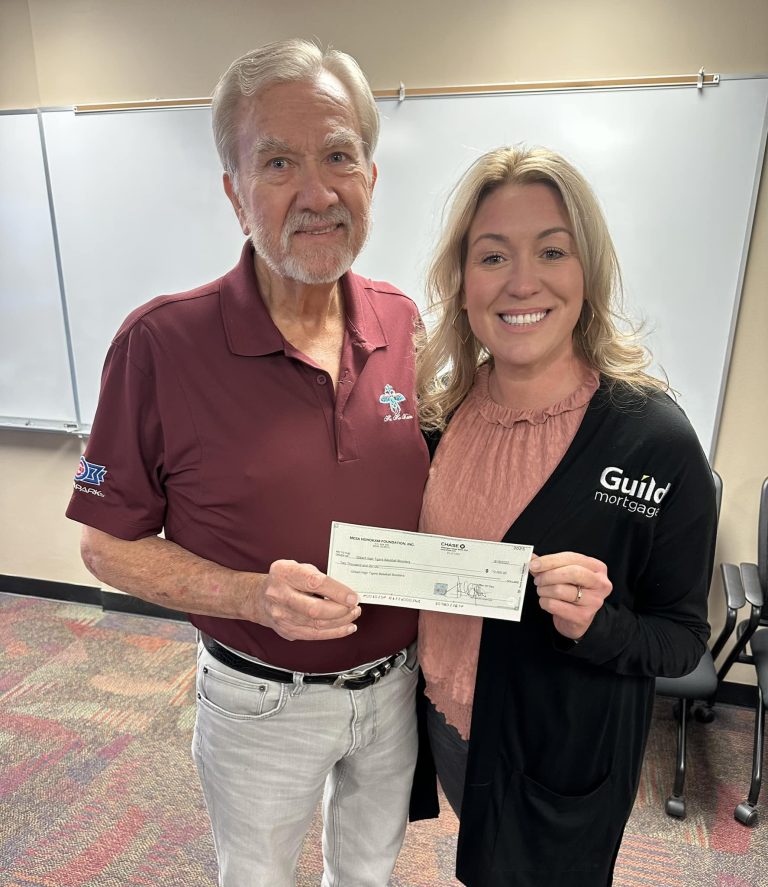 George F. Bliss presenting Mesa HoHoKam Grant Check for Gilbert Tigers Baseball Club to Shannon Heinze