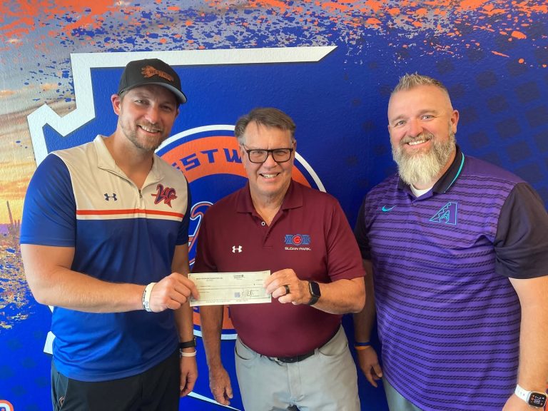 Westwood High School Track Mesa HoHoKam Steve Adams presented a Foundation grant to Westwood Track Coach Stacy Berg and Athletic Director Brady Pond. The funds will help purchase and install a new discus net.