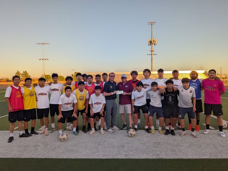 Mesa High School Boys Soccer Mesa HoHoKam Mark Grant presented a Foundation grant to Mesa High Boys Soccer Head Coach T.J. Hagen. The funds will help purchase equipment and new uniforms for the program.